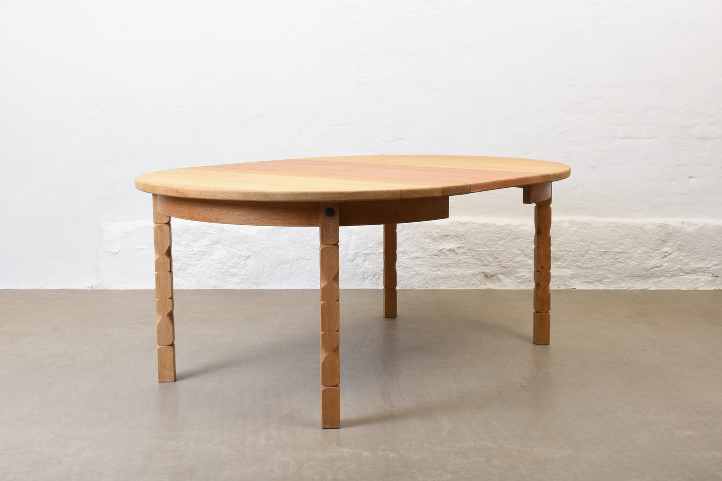 1970s extending oak dining table by Henning Kjærnulf