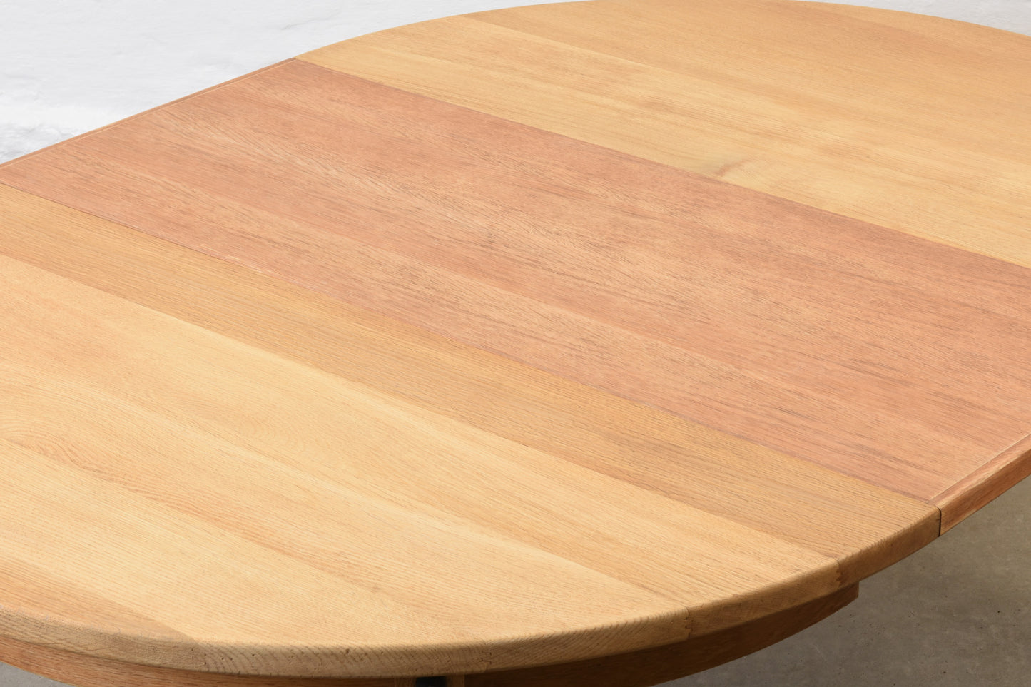 1970s extending oak dining table by Henning Kjærnulf