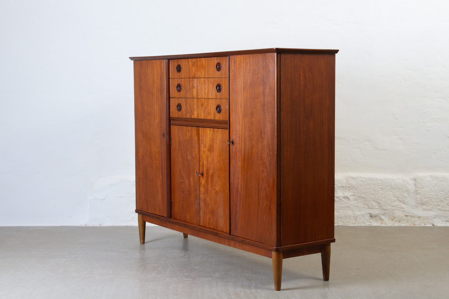 1950s tall sideboard in teak