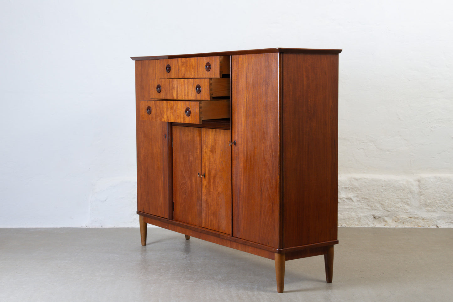 1950s tall sideboard in teak