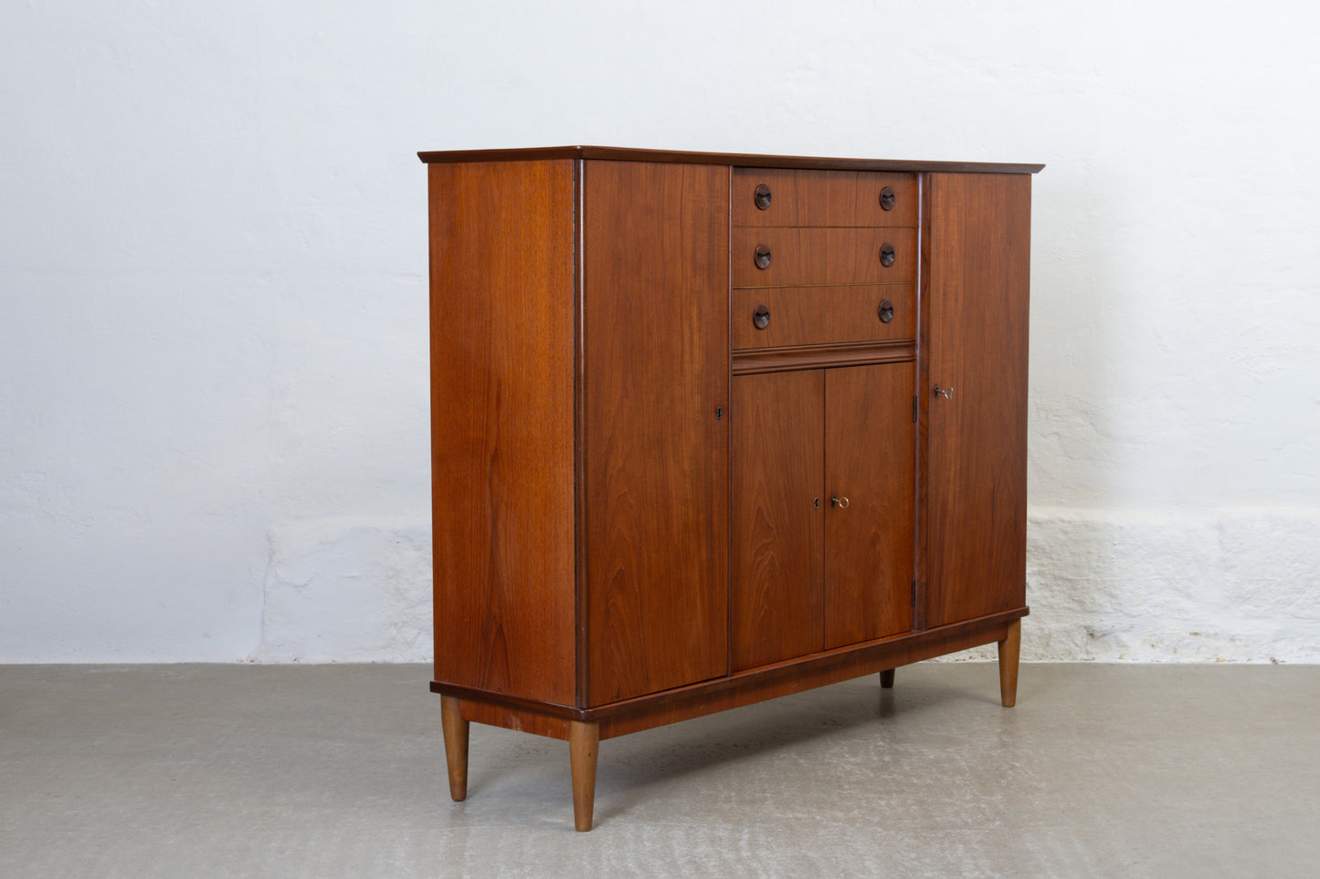 1950s tall sideboard in teak