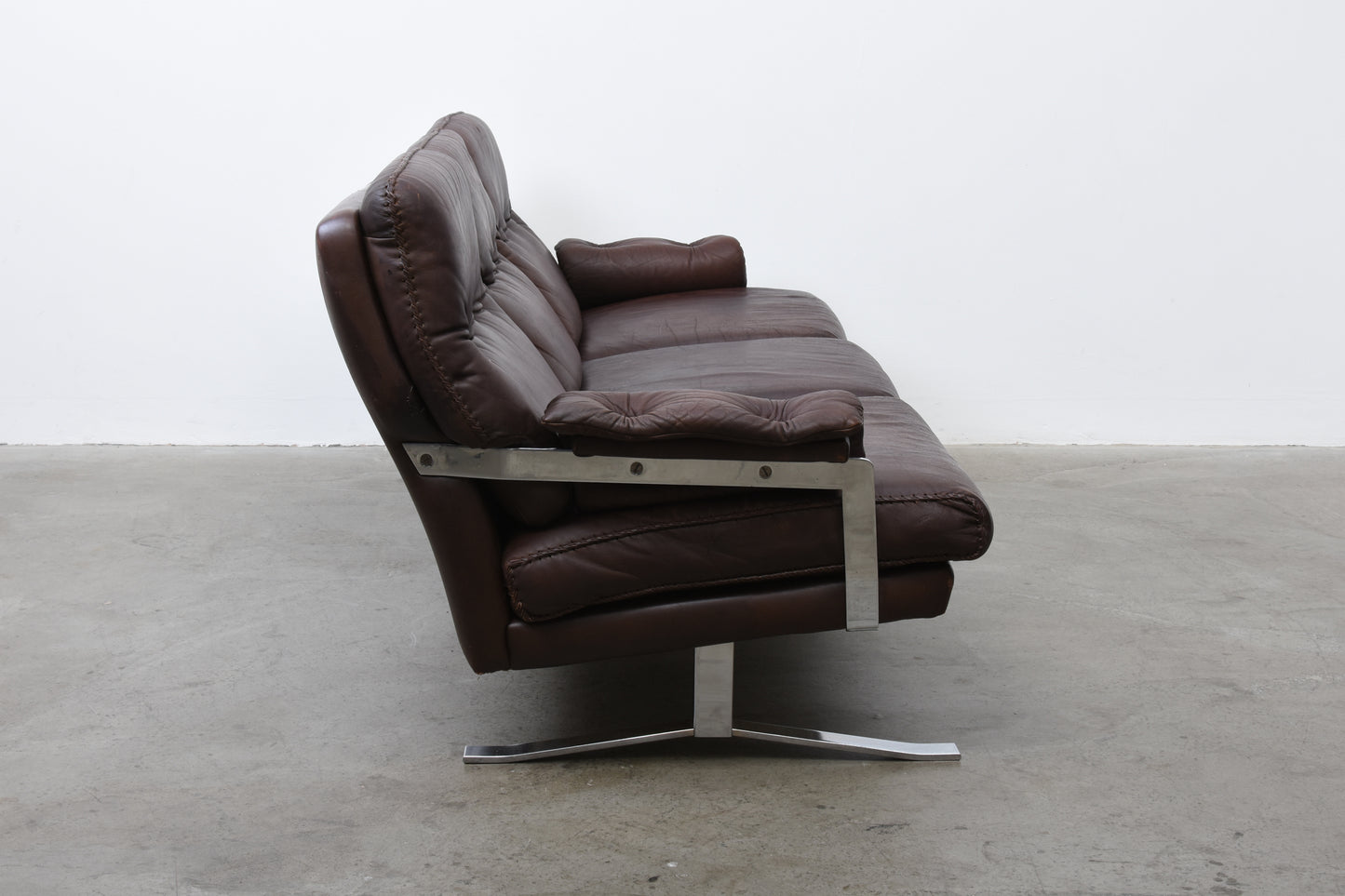 1960s leather + steel three seater by Arne Norell