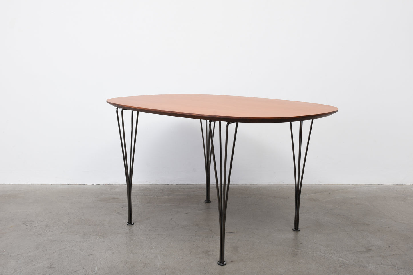 Danish teak table on metal legs
