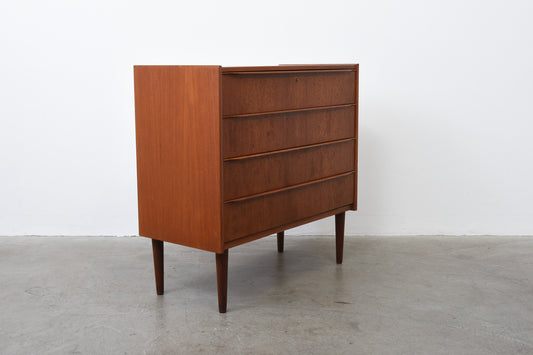 Low teak chest of drawers