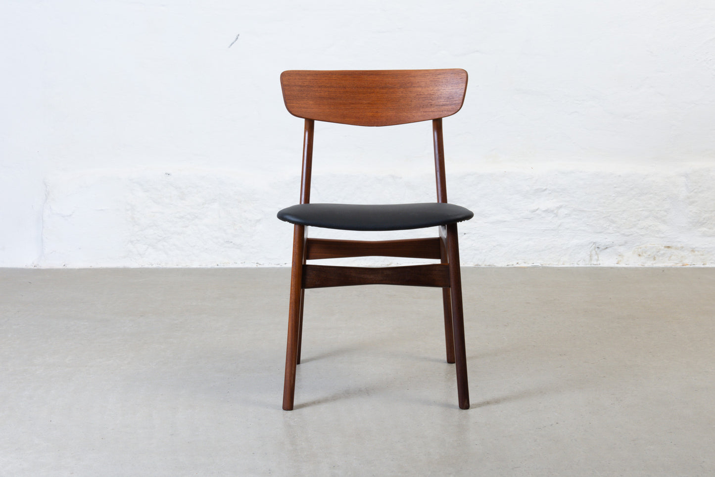 Newly reupholstered: 1960s set of four teak dining chairs
