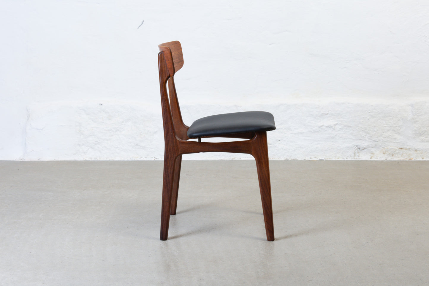 Newly reupholstered: 1960s set of four teak dining chairs