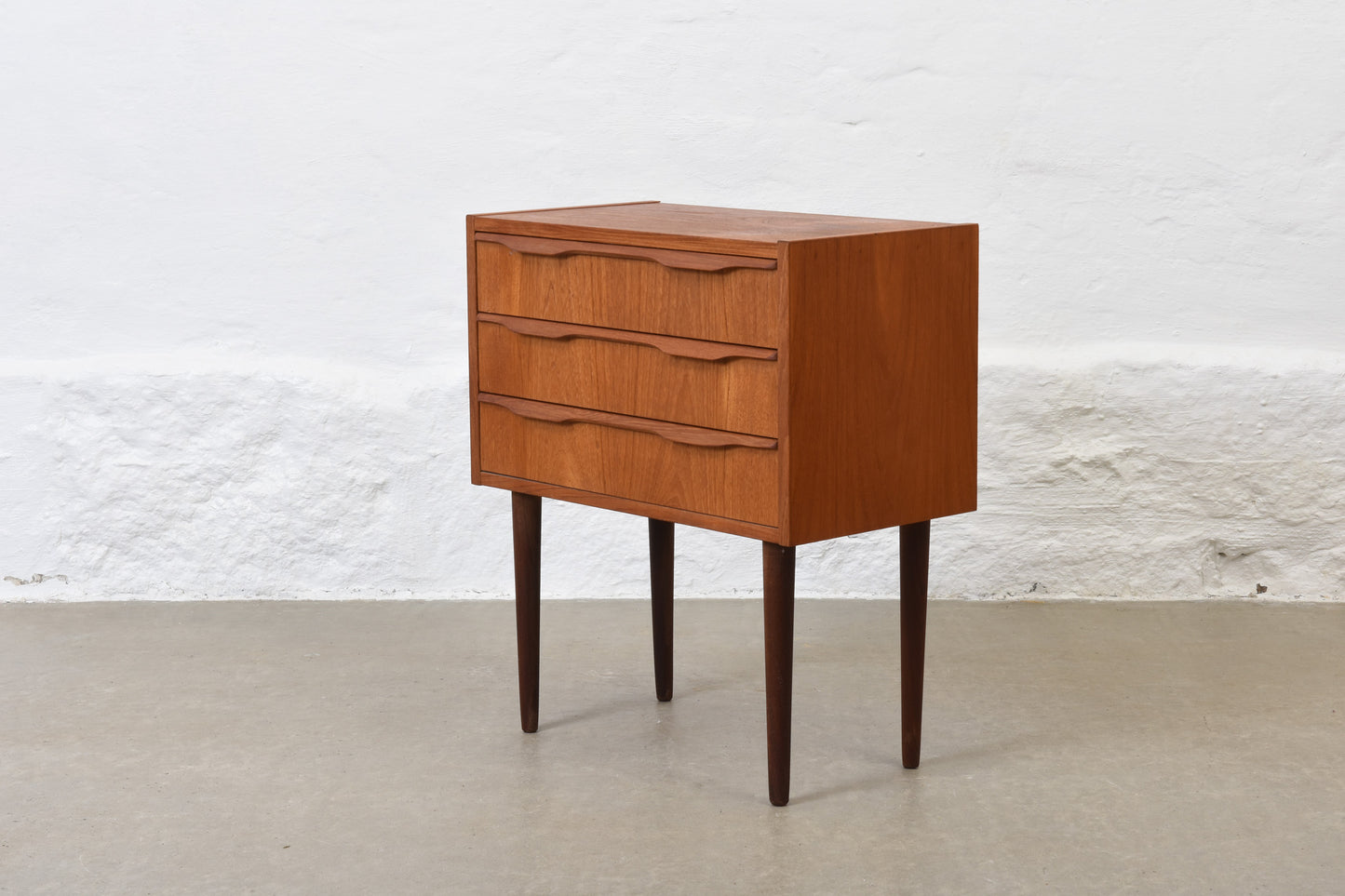 1960s low teak chest with lipped handles