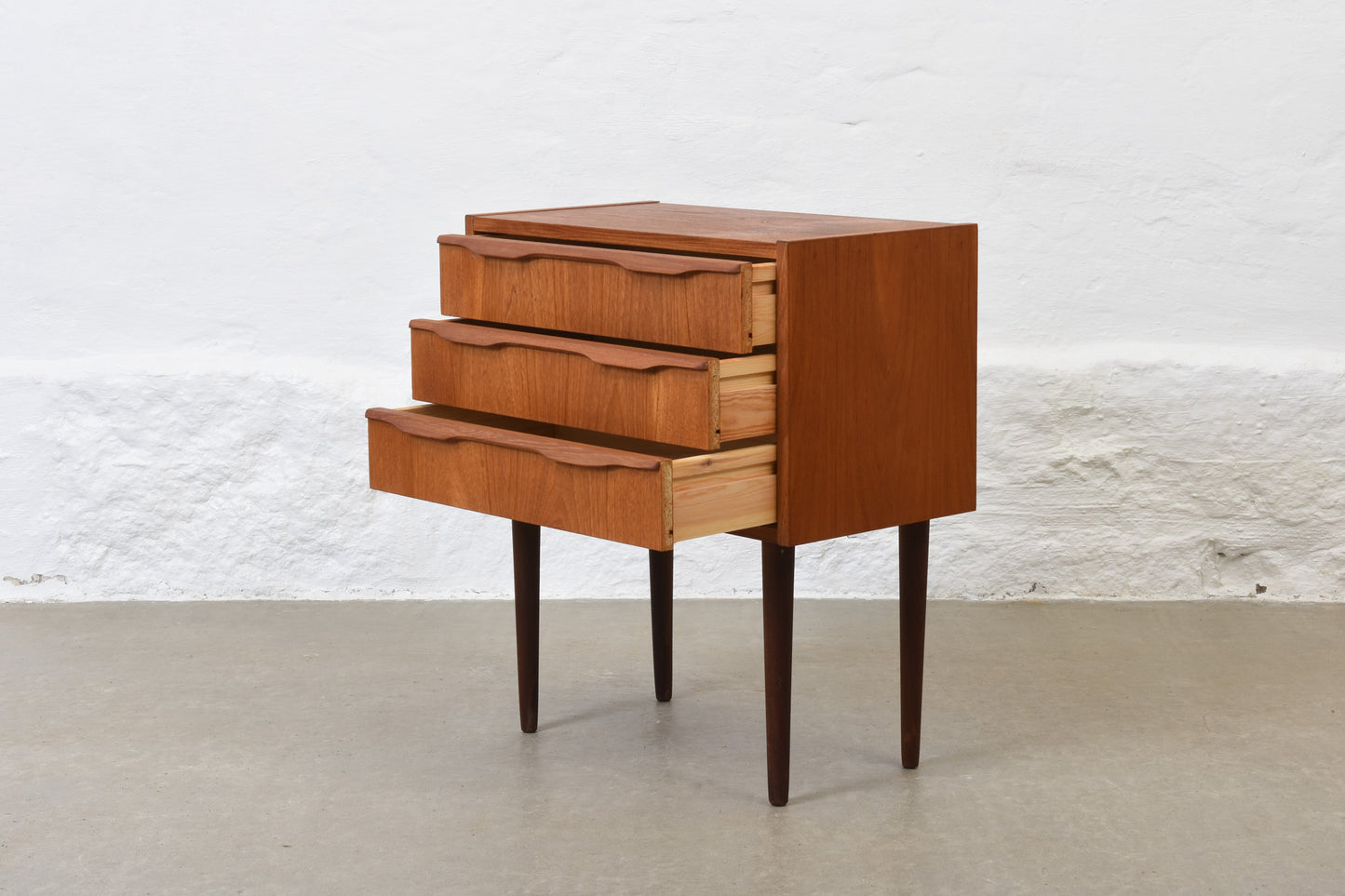 1960s low teak chest with lipped handles