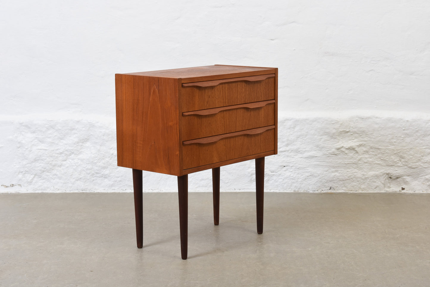 1960s low teak chest with lipped handles