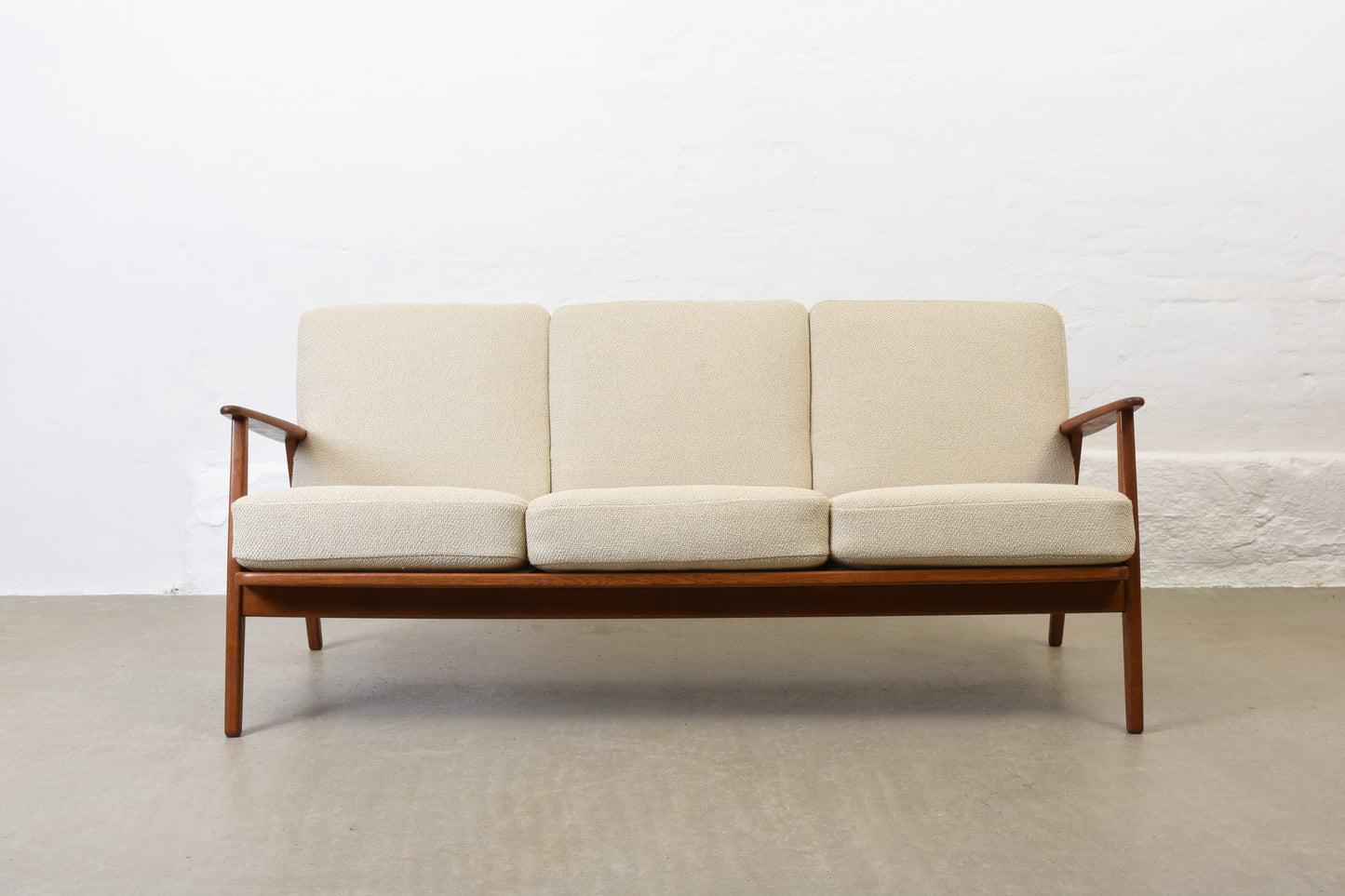 Newly reupholstered: 1950s 'Esbjerg' sofa in teak + oak