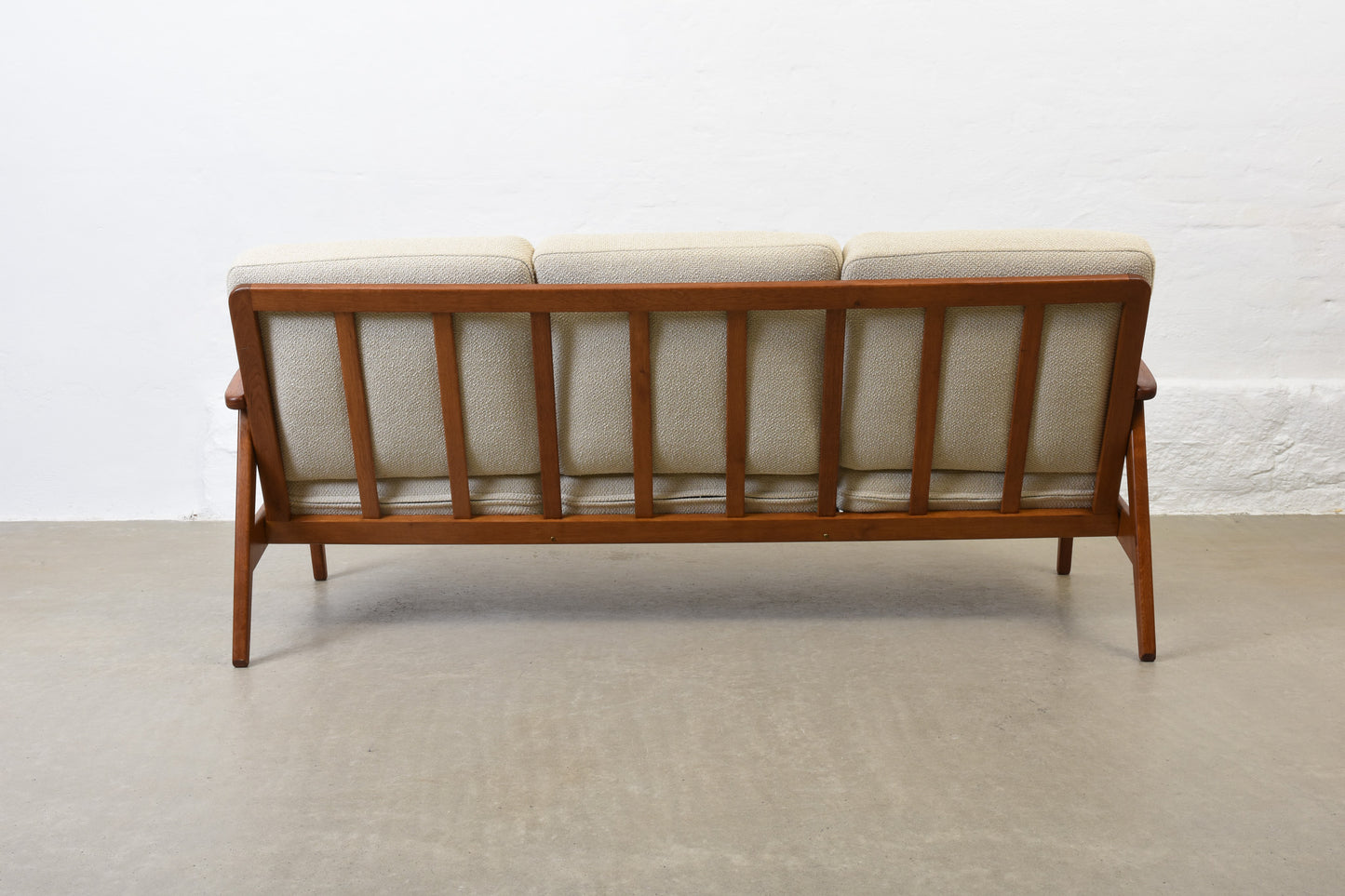 Newly reupholstered: 1950s 'Esbjerg' sofa in teak + oak