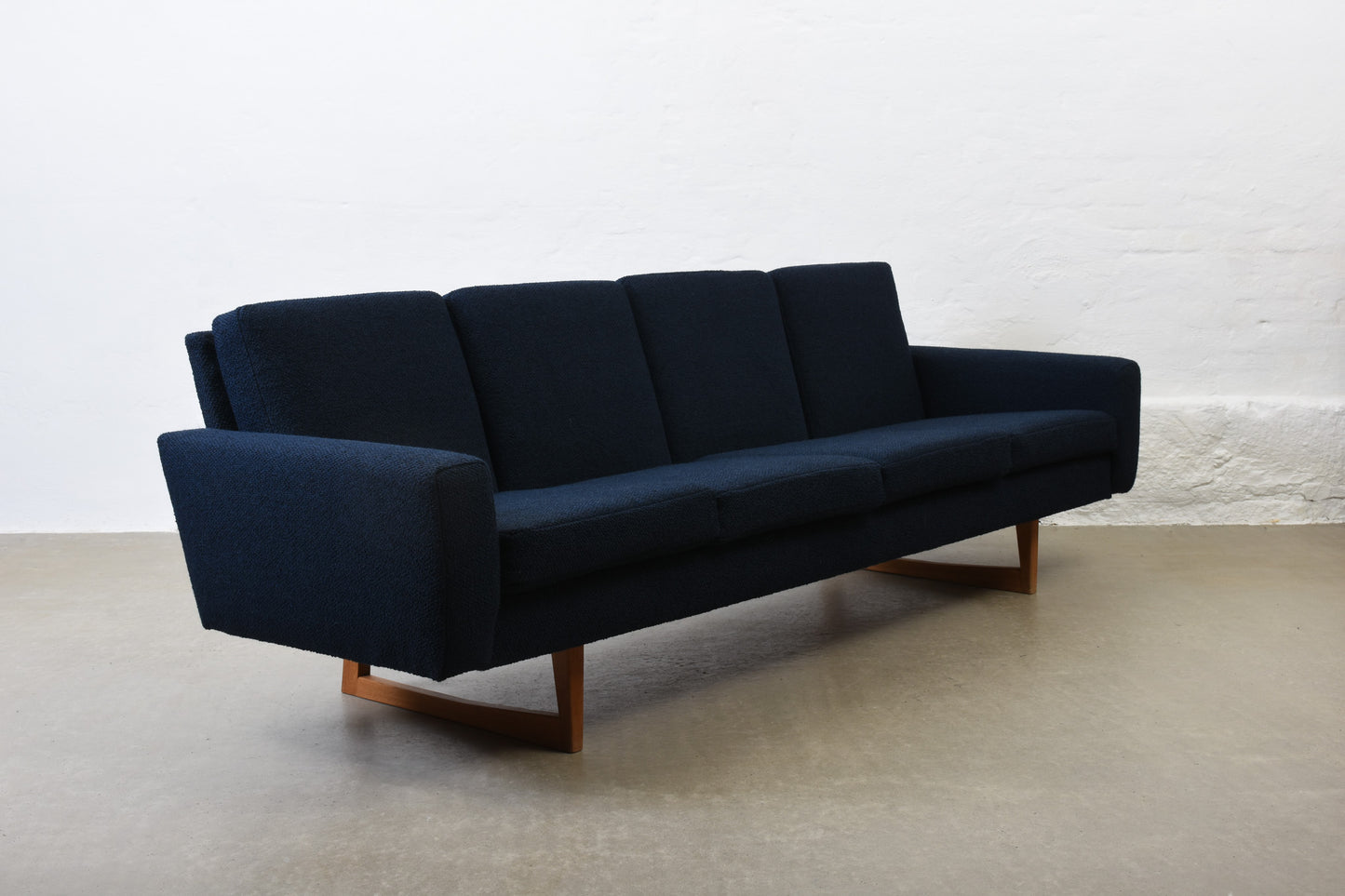 Newly reupholstered: 1960s four seater on oak sleigh legs