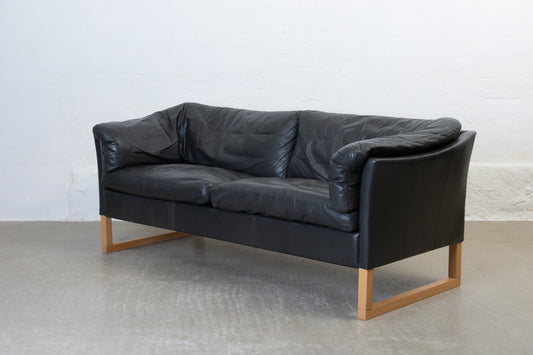 1980s leather sofa on beech sleigh legs