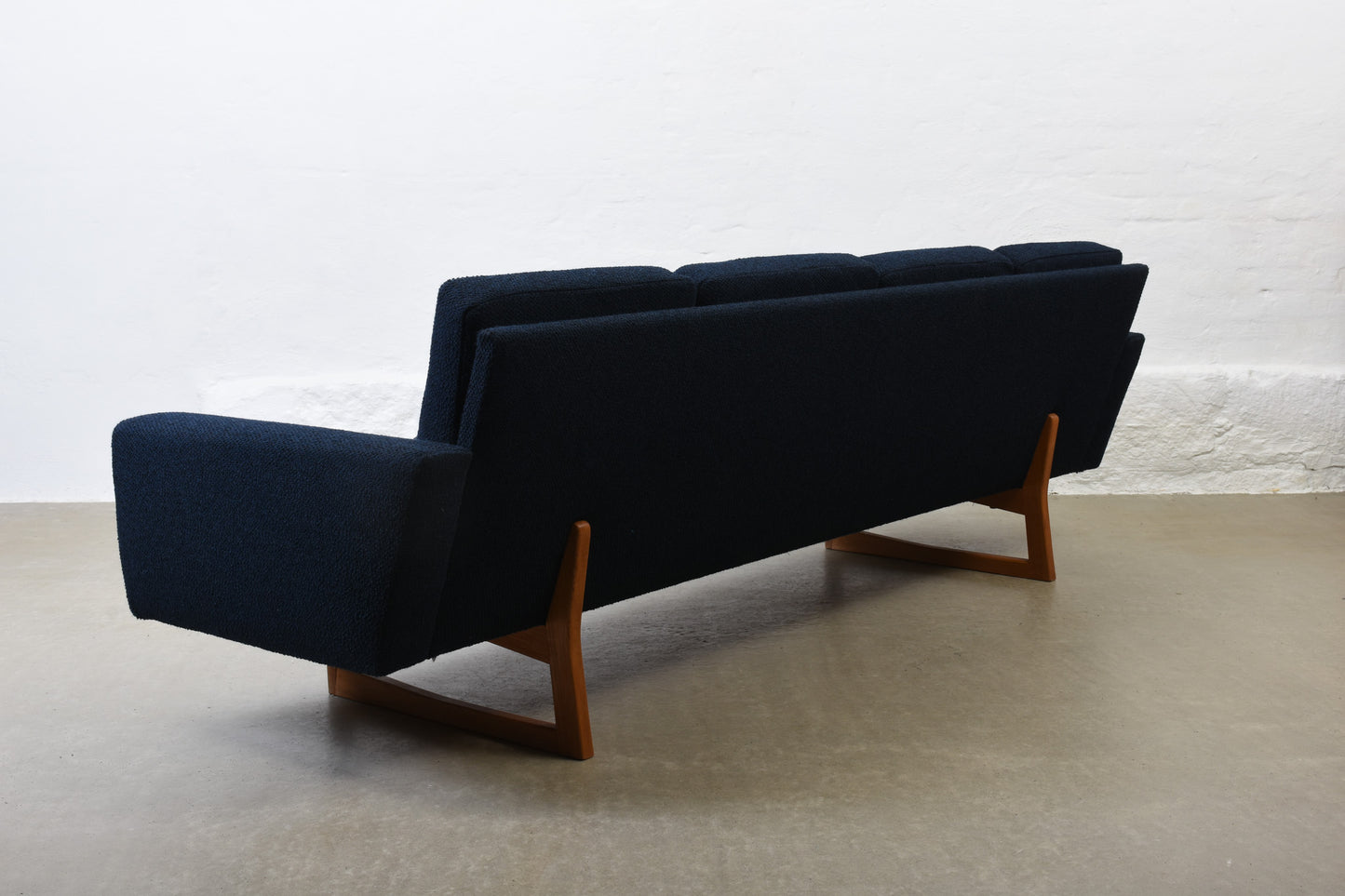 Newly reupholstered: 1960s four seater on oak sleigh legs