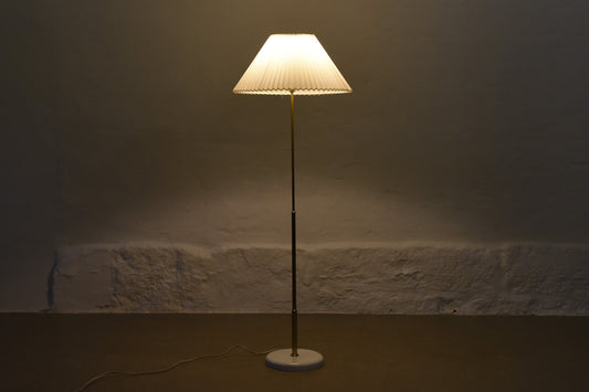 Two available: Brass floor lamps with pleated shades by Ateljé Lyktan