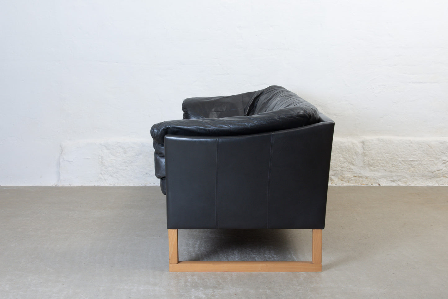 1980s leather sofa on beech sleigh legs