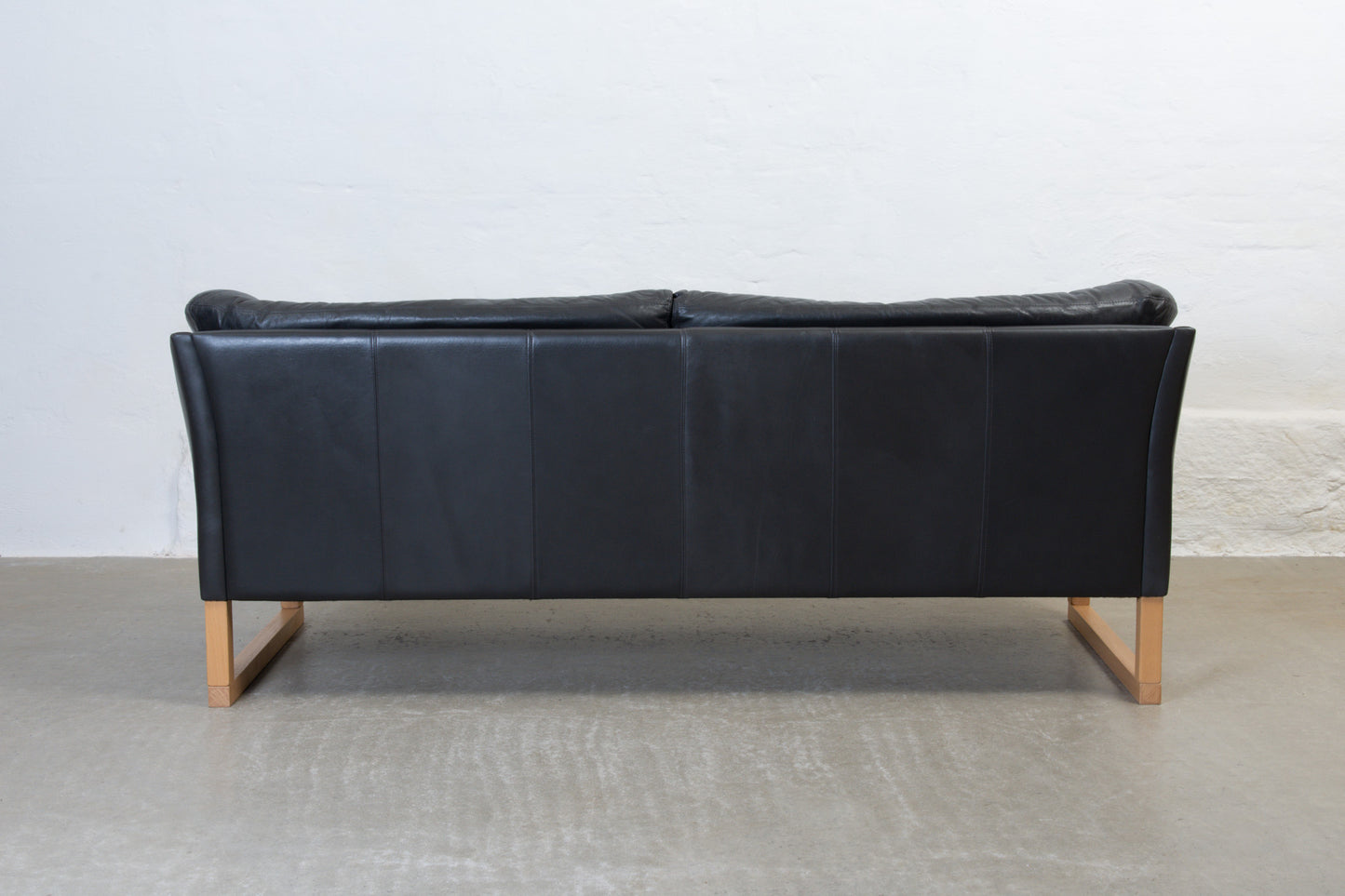 1980s leather sofa on beech sleigh legs