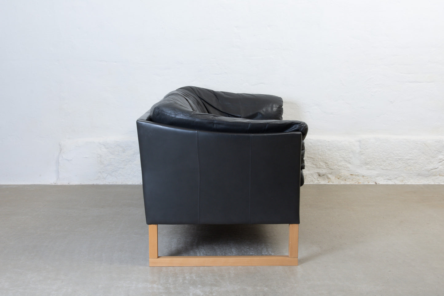 1980s leather sofa on beech sleigh legs