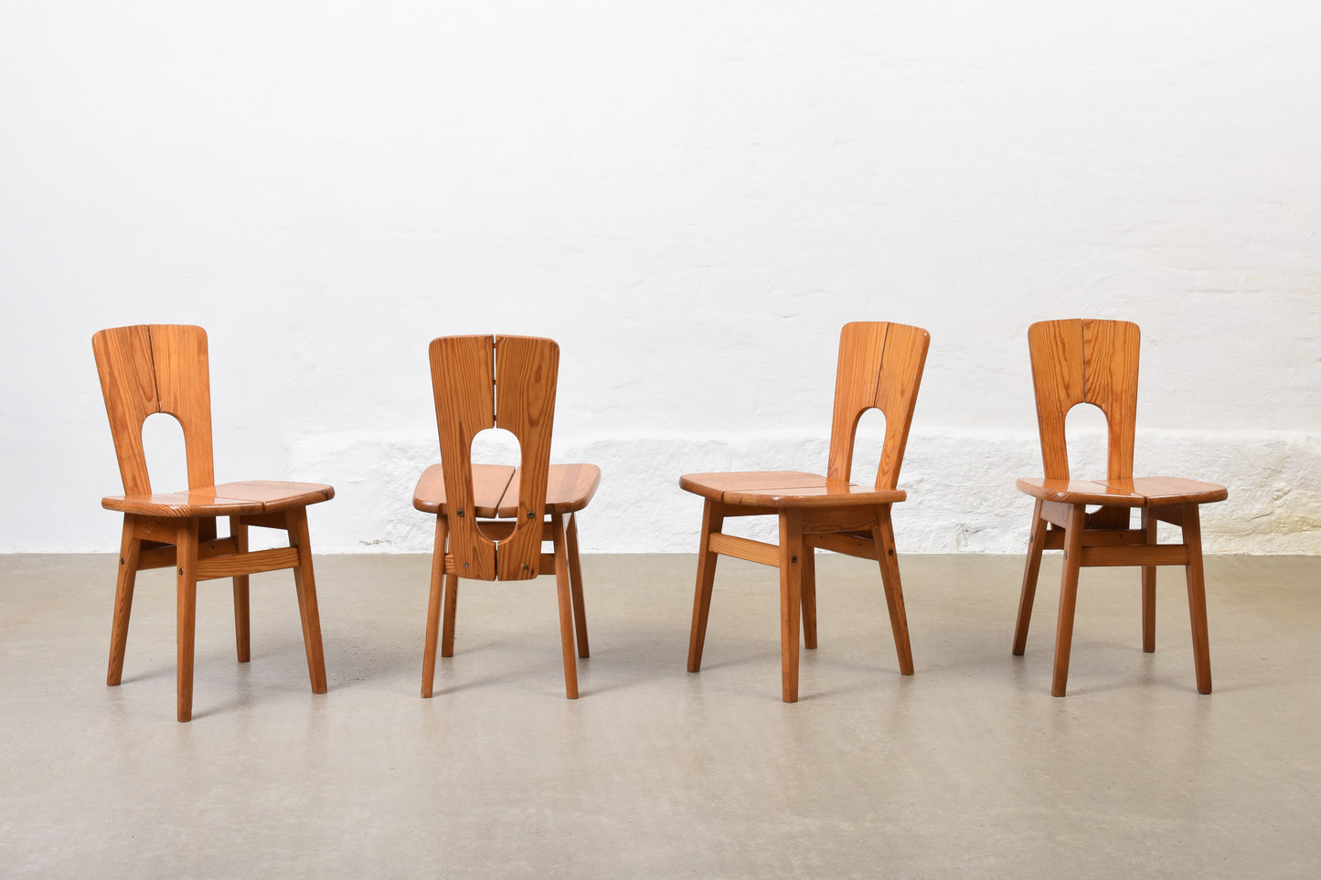 1960s set of four pine dining chairs by Ilmari Tapiovaara