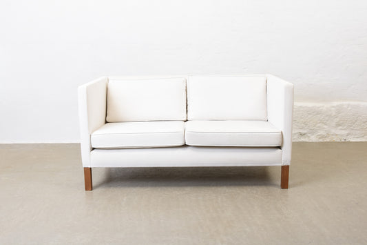 Vintage Danish two seat sofa in white cotton