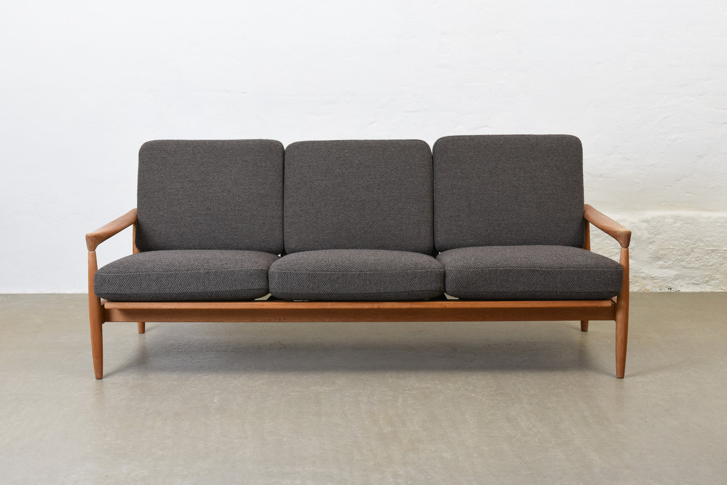 Newly reupholstered: 1960s oak sofa by Erik Wørts