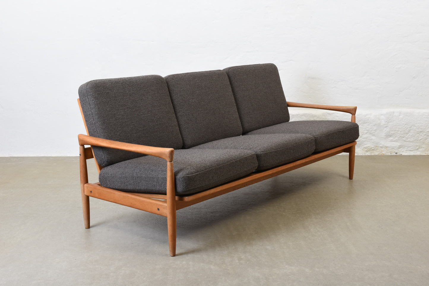 Newly reupholstered: 1960s oak sofa by Erik Wørts