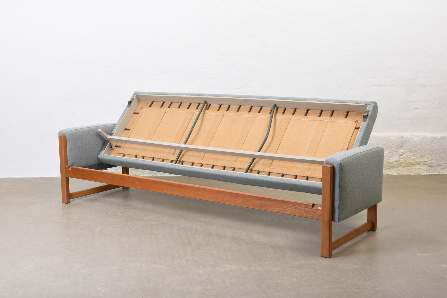 Newly reupholstered: 1960s oak sofa bed by Yngve Ekström