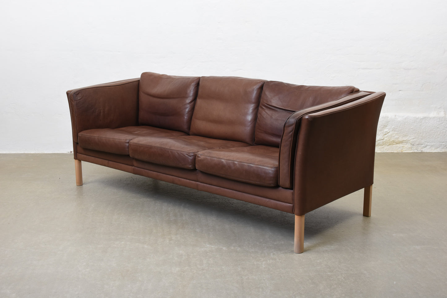 Vintage leather three seater by Mogens Hansen