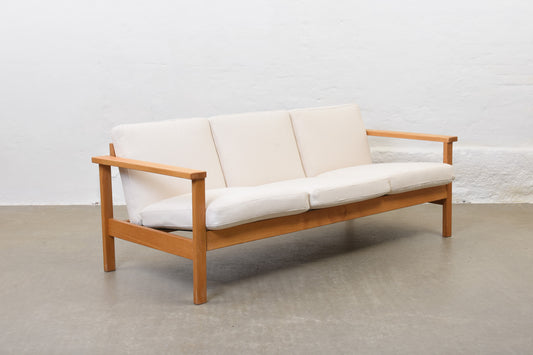 Newly reupholstered: 1960s oak + canvas three seater