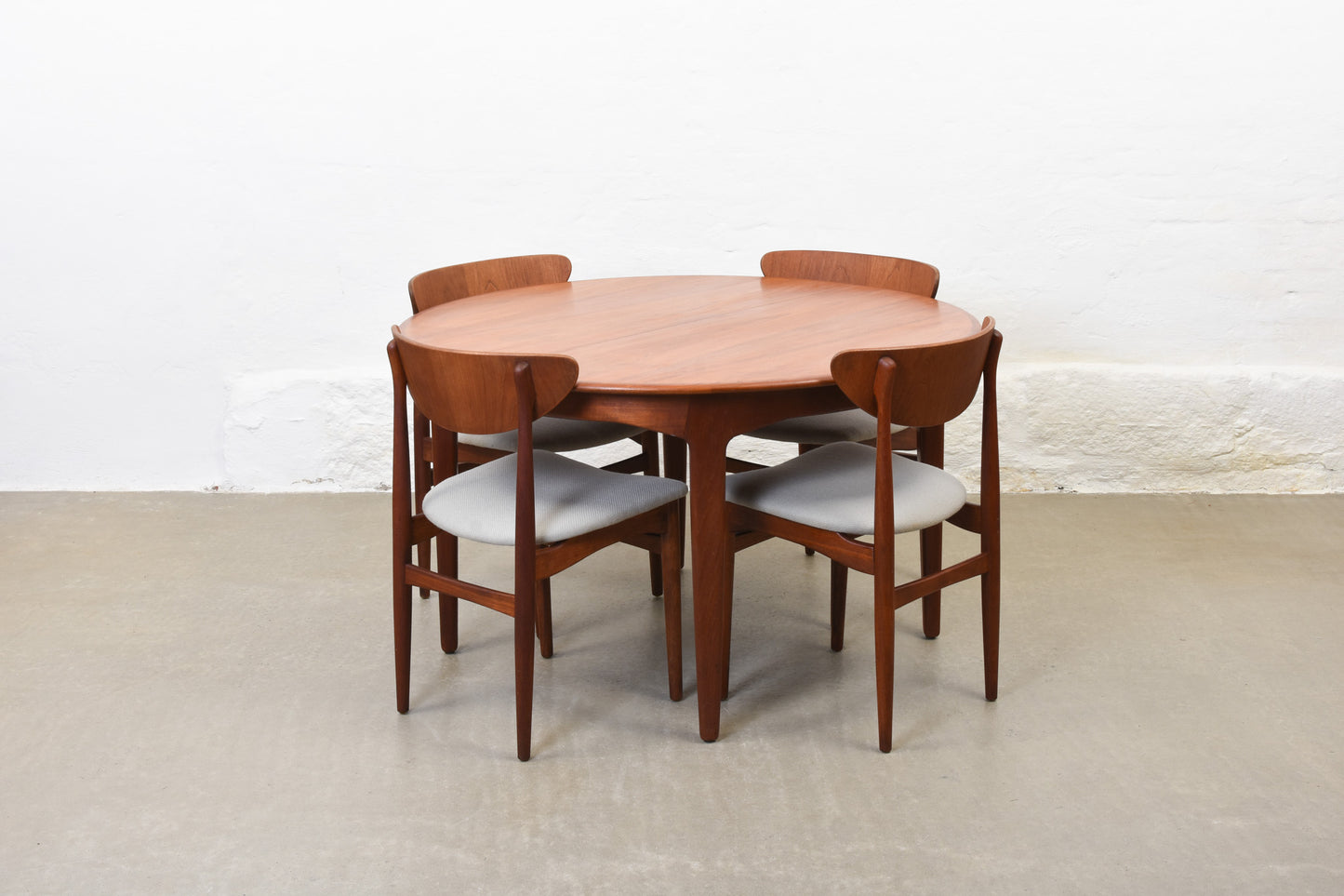 Newly reupholstered: Set of 1950s teak dining chairs by Henning Kjærnulf