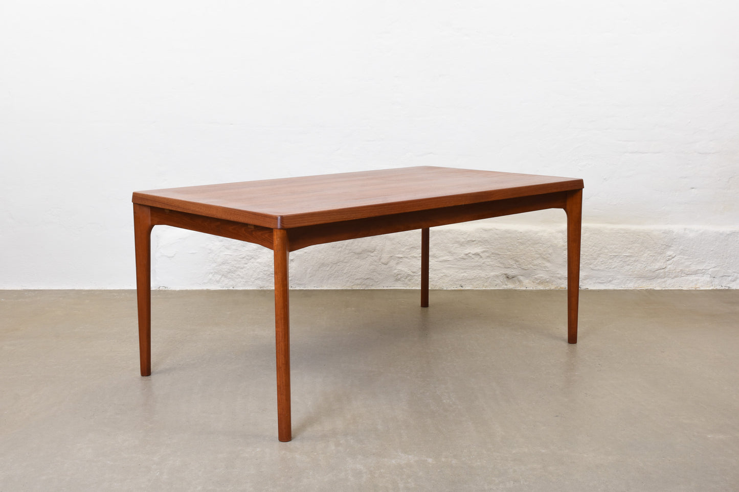 1960s extending dining table in teak by Henning Kjærnulf