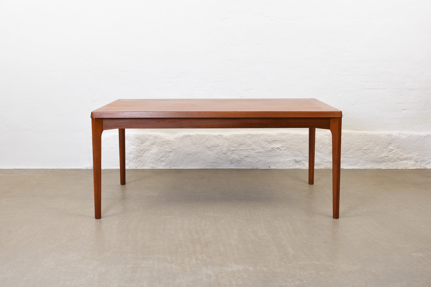 1960s extending dining table in teak by Henning Kjærnulf