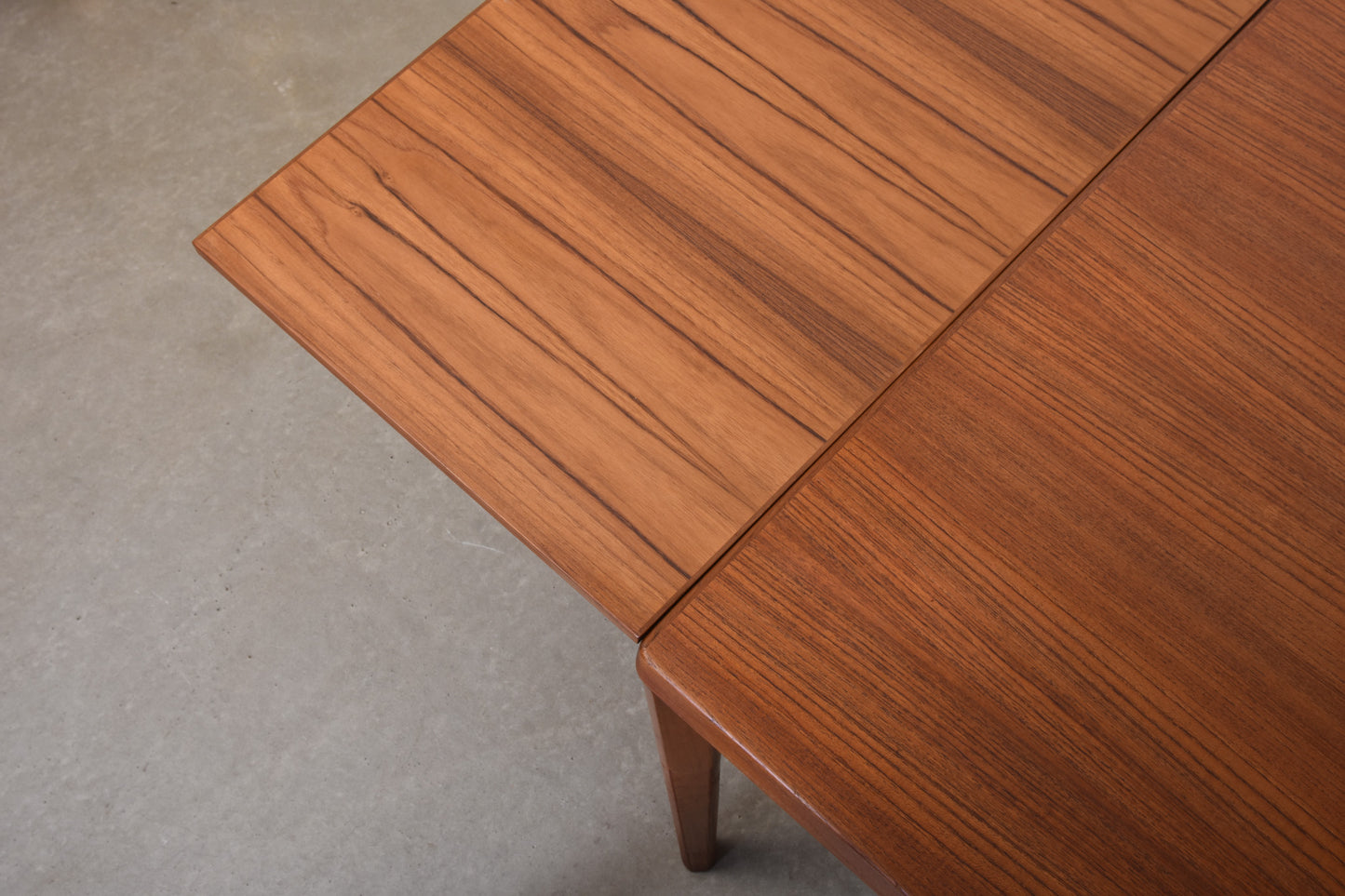 1960s extending dining table in teak by Henning Kjærnulf