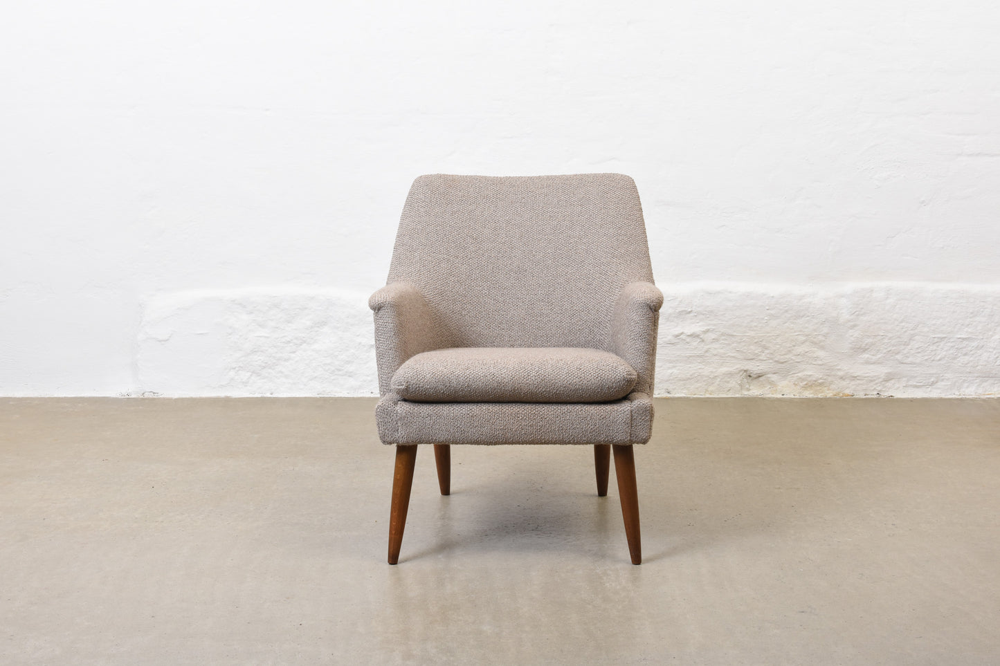 Newly reupholstered: 1950s lounge chair by Georg Thams