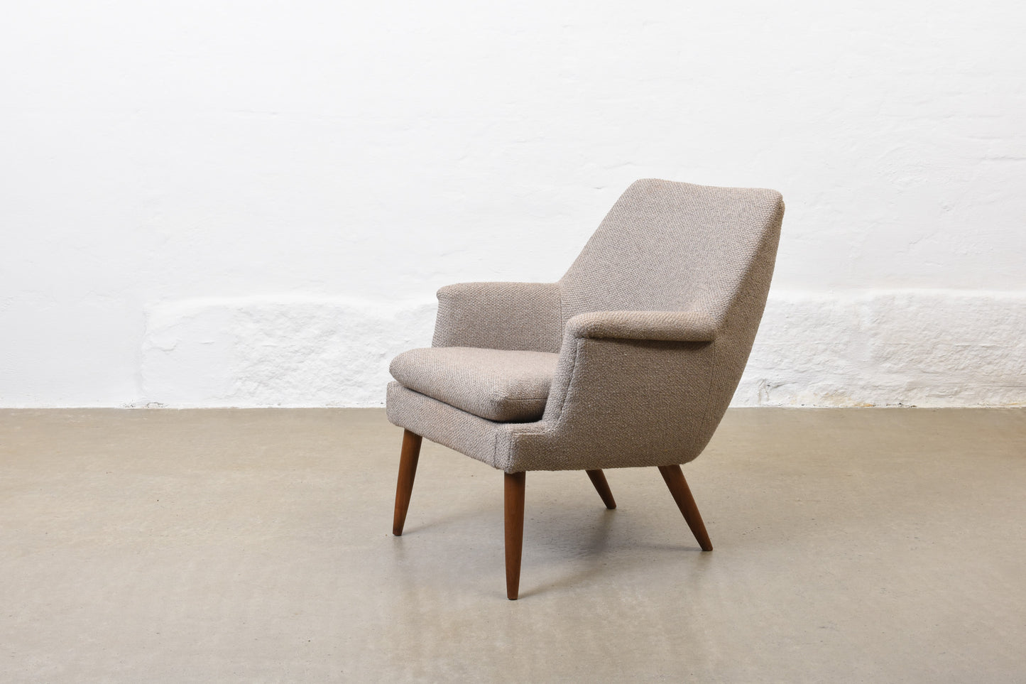 Newly reupholstered: 1950s lounge chair by Georg Thams