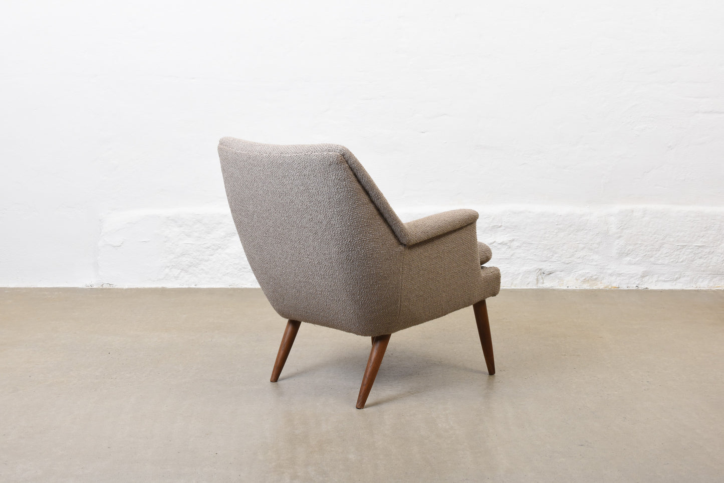 Newly reupholstered: 1950s lounge chair by Georg Thams