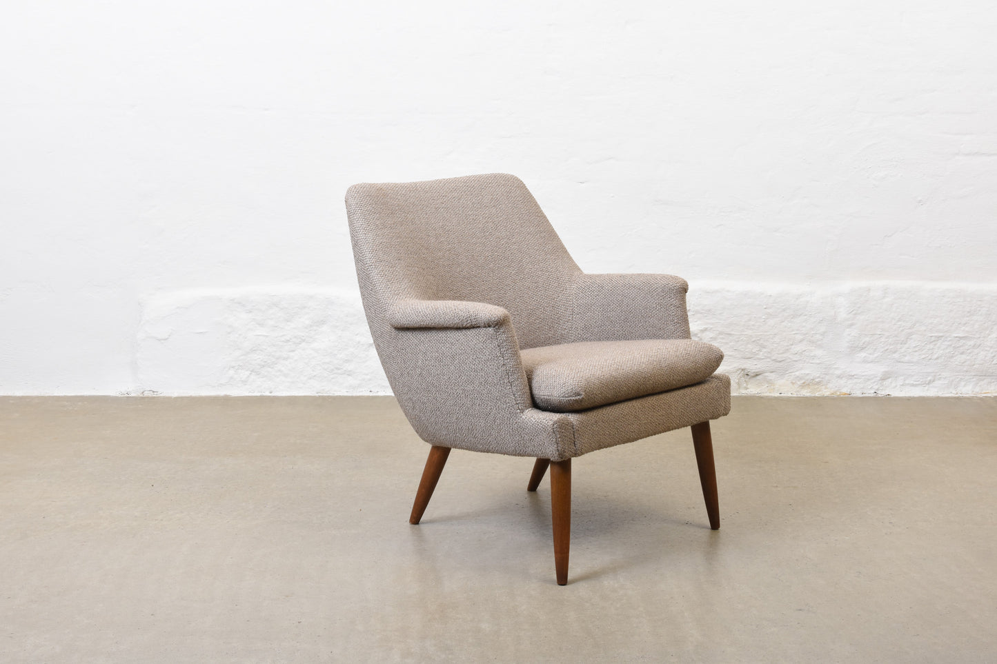 Newly reupholstered: 1950s lounge chair by Georg Thams