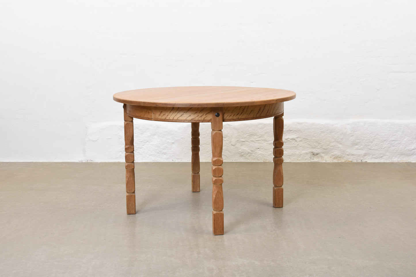 1970s extending oak dining table by Henning Kjærnulf