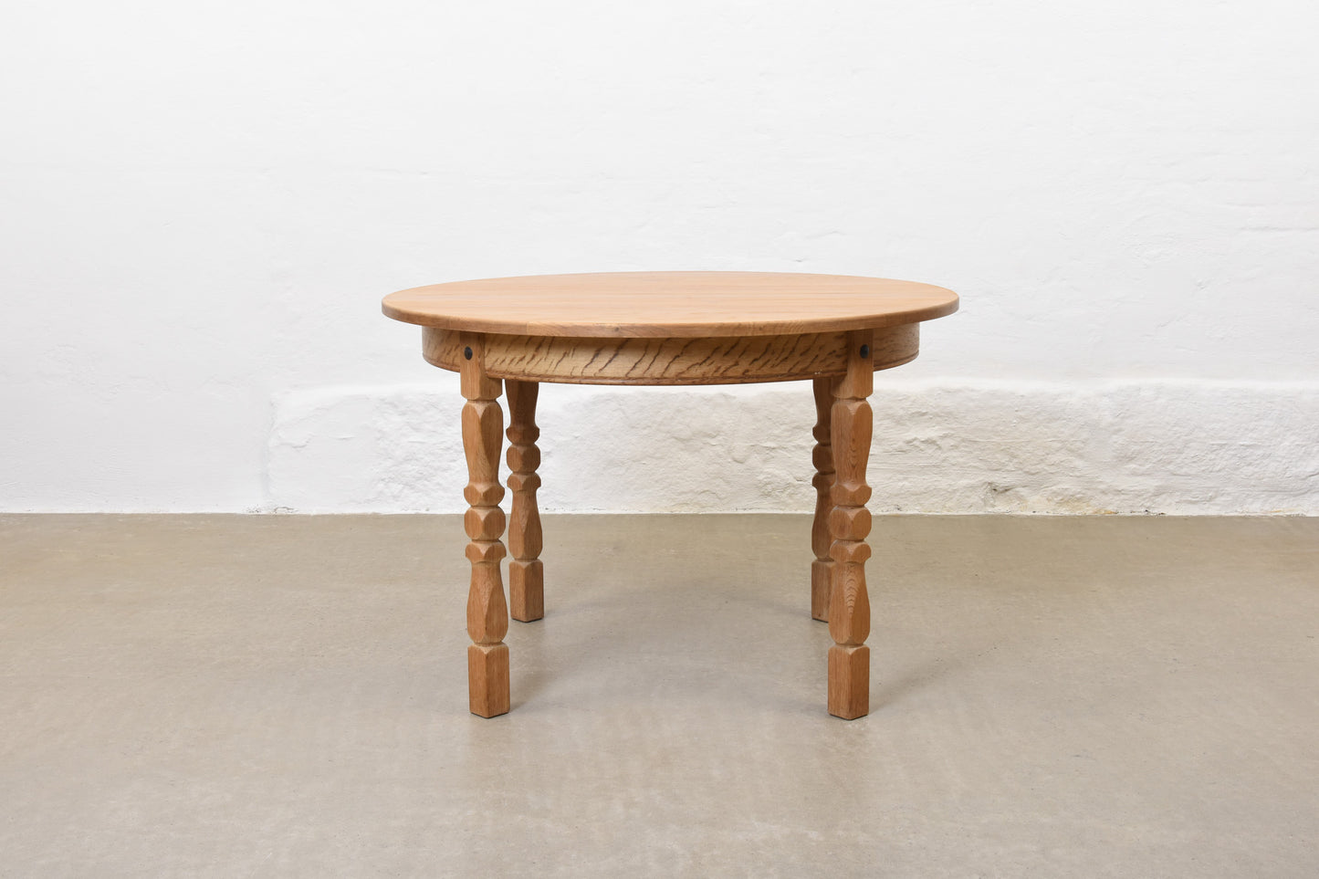 1970s extending oak dining table by Henning Kjærnulf