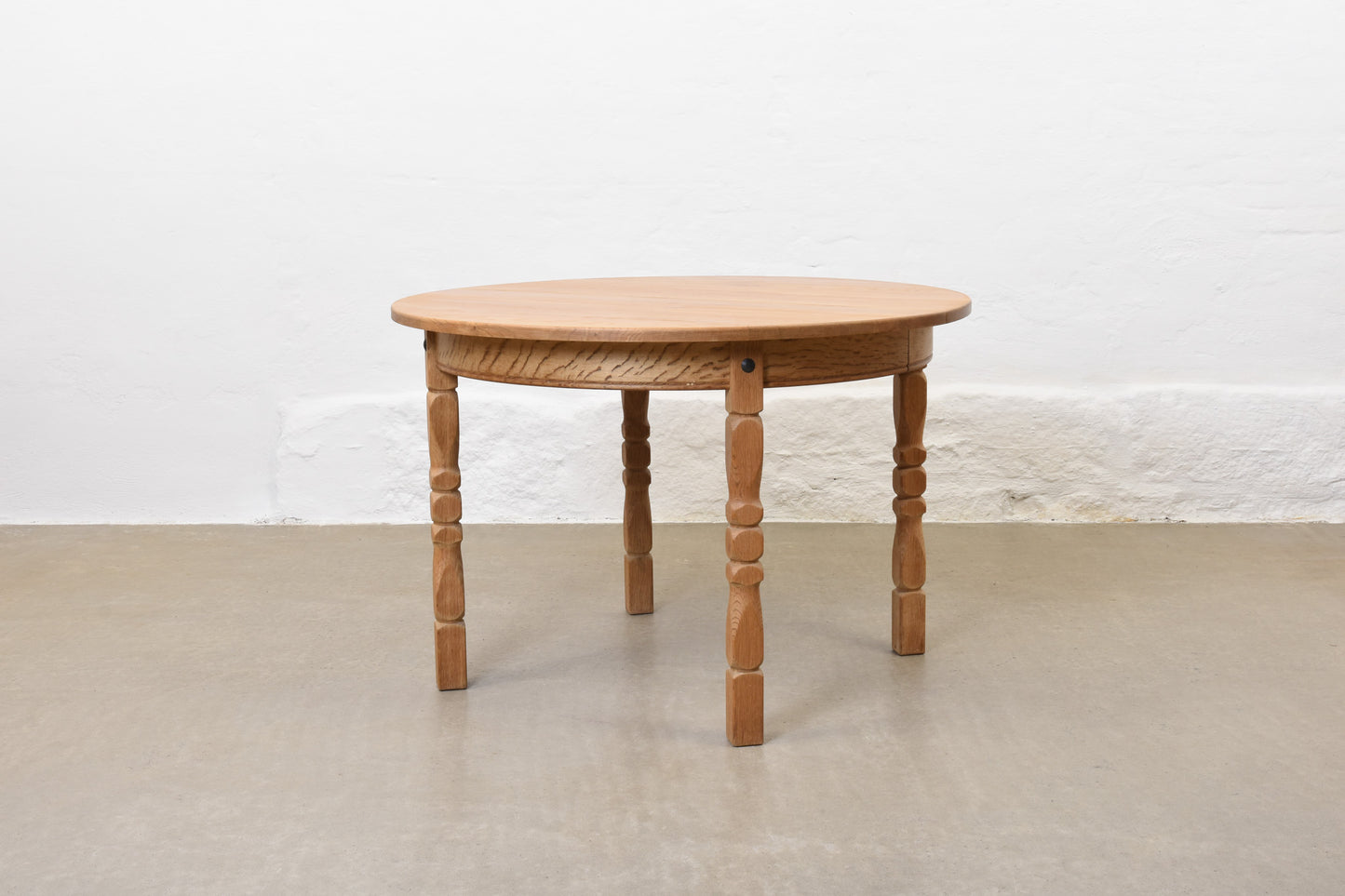 1970s extending oak dining table by Henning Kjærnulf