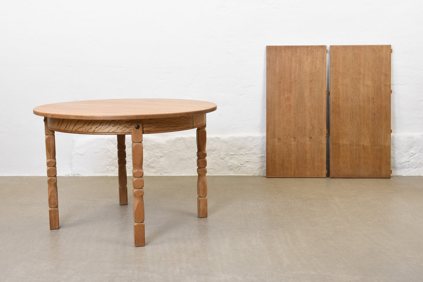 1970s extending oak dining table by Henning Kjærnulf