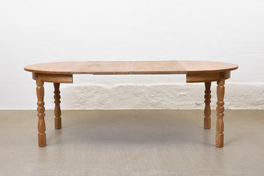 1970s extending oak dining table by Henning Kjærnulf