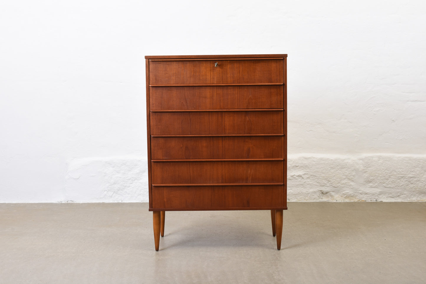 1960s teak chest of drawers with lipped handles