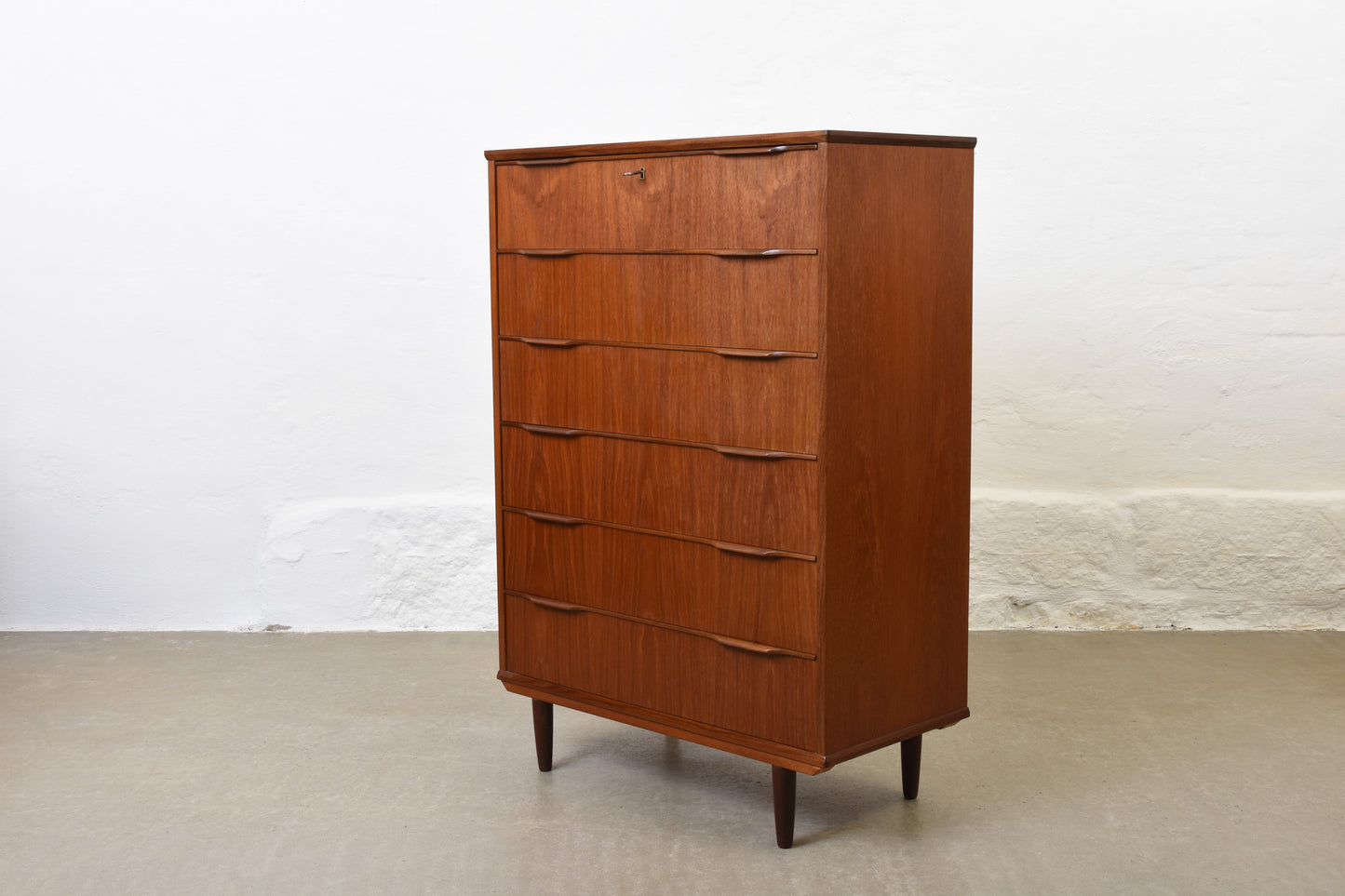 1960s teak chest of drawers with lipped handles