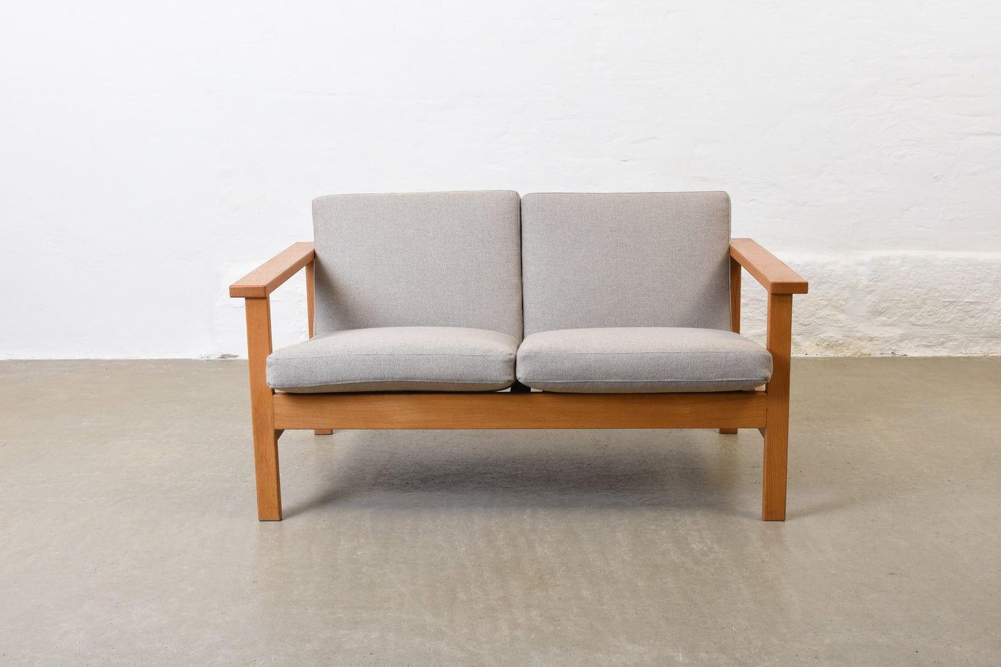 Newly reupholstered: 1960s oak + wool two seater