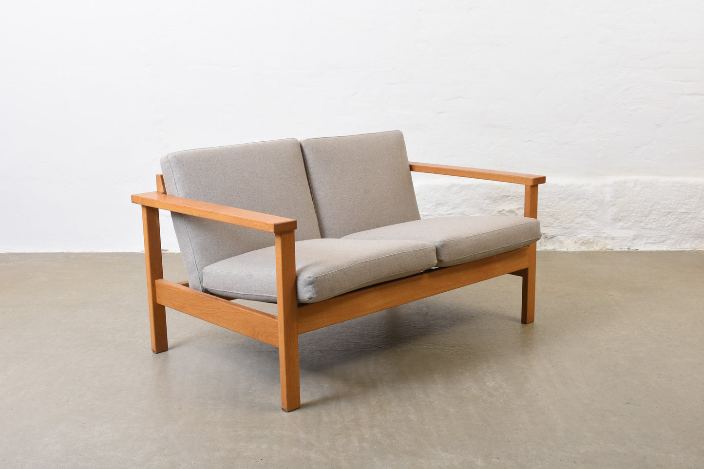 Newly reupholstered: 1960s oak + wool two seater