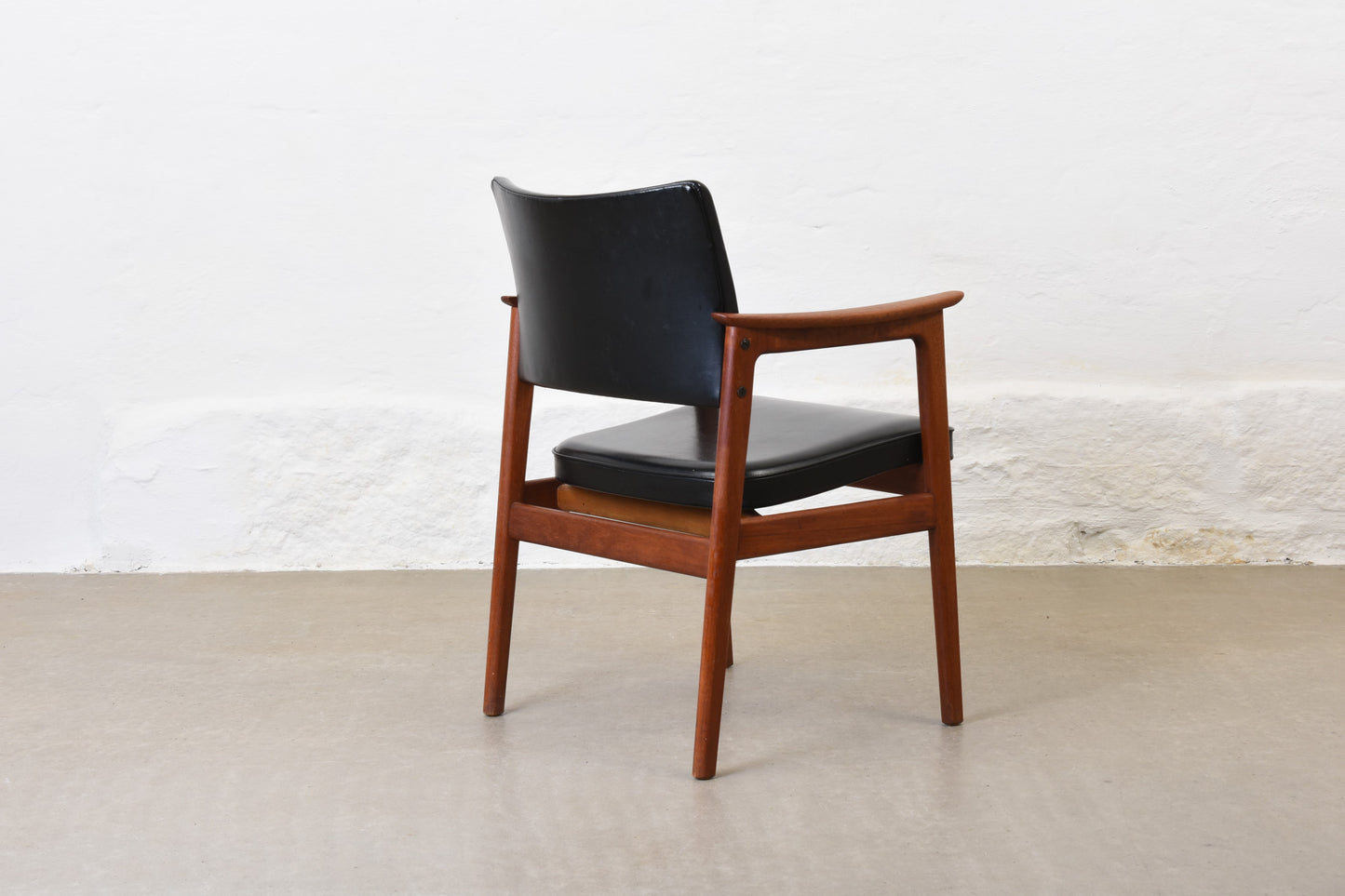 1960s teak + vinyl armchair by Erik Kirkegaard