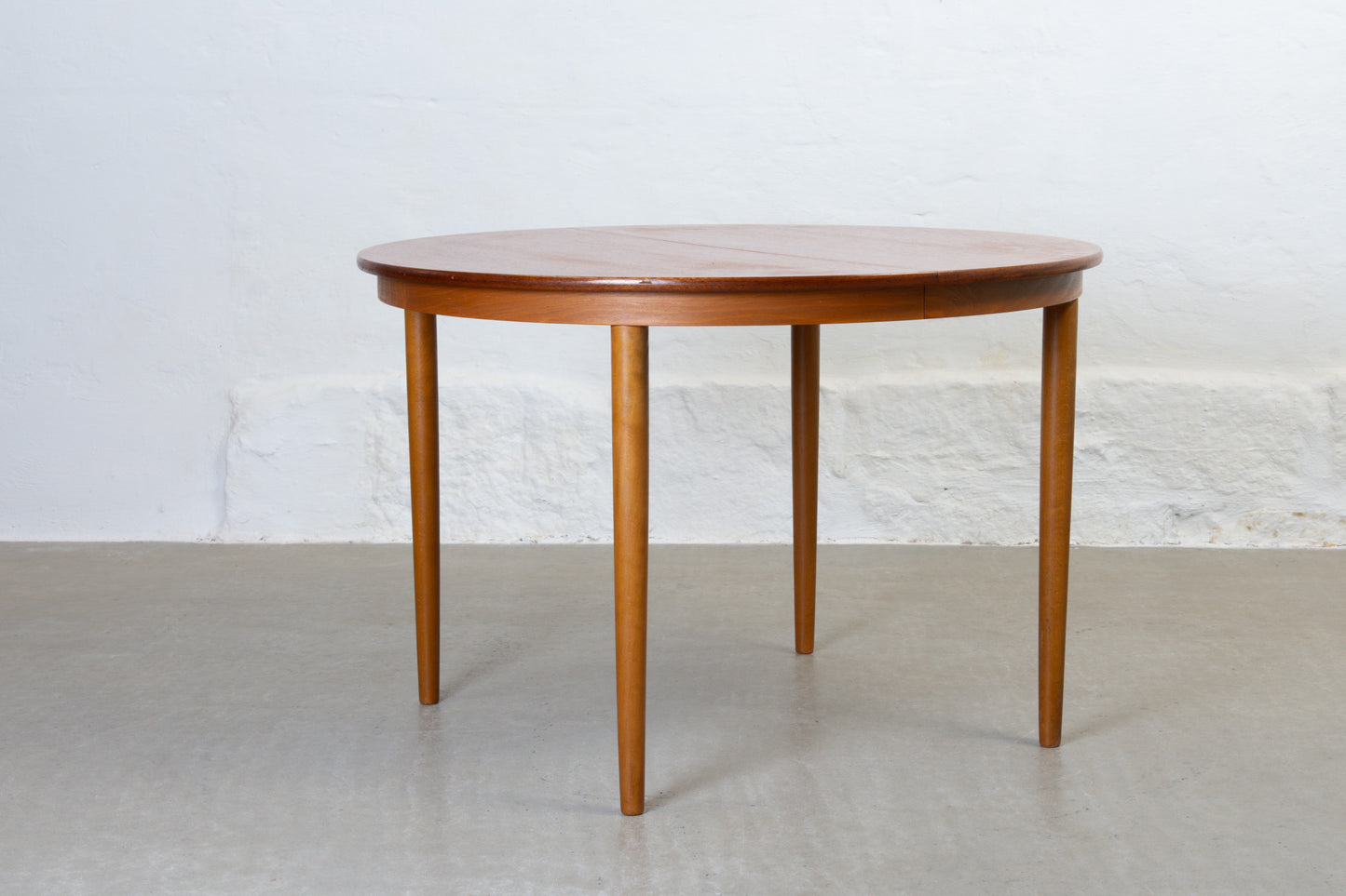 1960s extending dining table in teak -110D cm