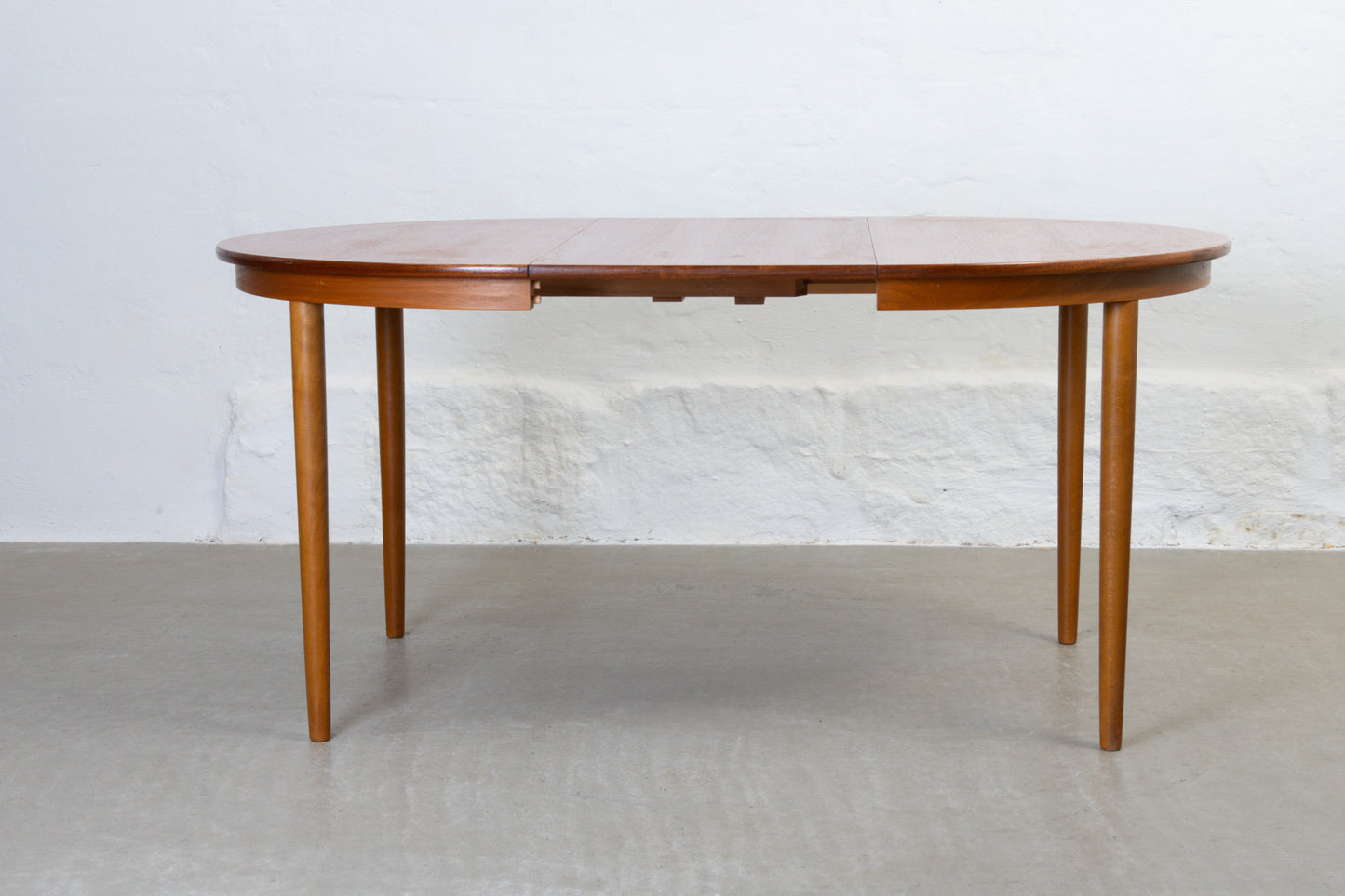1960s extending dining table in teak -110D cm
