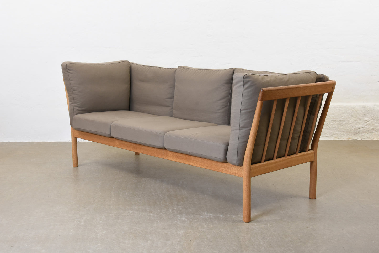 Newly reupholstered: 1980s oak three seater by Finn Østergaard